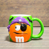 マグカップ　【M&M’s(エムアンドエムズ)】　オレンジ・パイレーツ